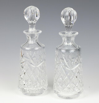A pair of Brierley cut glass decanters and stoppers 29cm 