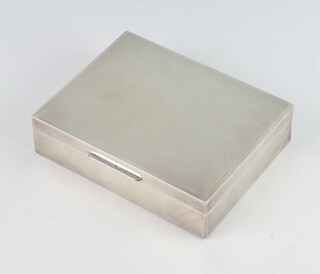 A rectangular silver engine turned cigarette box Birmingham 1969, 11cm 