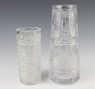 A 20th Century Bohemian cut glass vase decorated with a cathedral 28cm, a cylindrical ditto 20cm 
