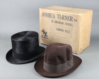 A black silk top hat by Joshua Turner size 7 1/8 contained within a Joshua Turner hat box, a brown Homburg by Dunn & Co. size 7 and a pair of Dents white leather gloves size 8 