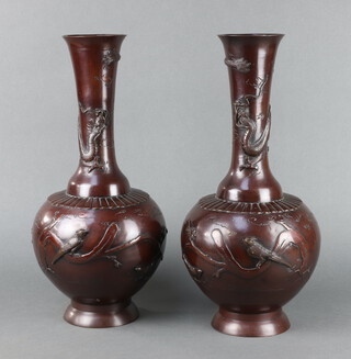 A pair of 19th Century Japanese bronze club shaped vases decorated birds 46cm h 