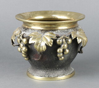 A polished bronze jardiniere with grape and vinous decoration raised on a spreading foot 15cm h x 12cm diam. 