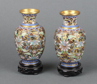 A pair of 20th Century Chinese cloisonne enamelled club shaped vases on hardwood stands, cased 12cm x 4cm 