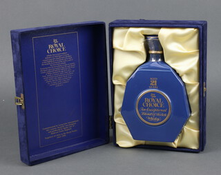A bottle of 21 year old Long John Royal Choice Blended Scotch Whisky contained in a plush box (hinge f) 