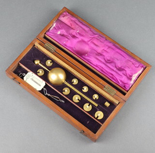 A Fairbairn Sykes hydrometer contained in a mahogany case (magnifying glass missing, some dents to the ball)