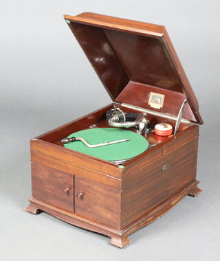 A model 126 HMV His Master's Voice gramophone, contained in a mahogany case on bracket feet 39cm h x 40.5cm w x 50cm d, together with a small collection of records 