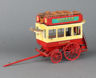 A scratch built wooden model of a horse drawn omnibus 17cm h x 11cm w x 36cm l 