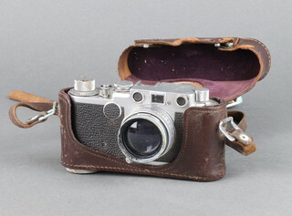 A Leica DR/P camera NR681512 marked Leica DRP Ernst Leitz GMB H, contained in a leather carrying case (some corrosion to the side of the lens)