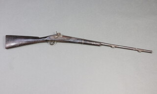 An Indian Army percussion rifle musket with 79cm (unmarked) barrel and wooden stock, (ram rod missing) 