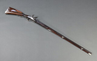 In the manner of Leontiev of Tula, a sporting flintlock musket with 88cm barrel, engraved white metal lock, walnut stock with padded velvet cheek piece and inlaid white metal furniture, complete with ivory tipped ram rod 