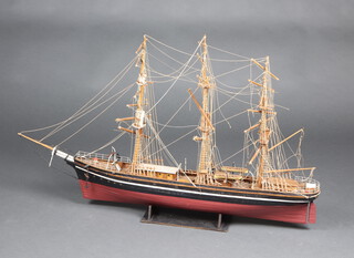 A 19th/20th Century wooden 3 masted model sailing ship 65cm h x 110cm w x 16cm d 