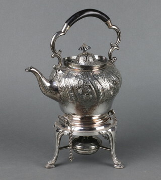 A Victorian silver plated tea kettle on stand with burner and ebony mounts 