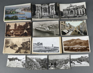 A collection of black and white postcards