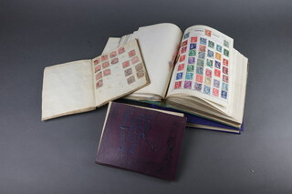 A blue Grafton album of used GB stamps, a green worldwide album of world stamps - USA, Switzerland, Portugal, Italy, India, Holland, Germany, a purple Stanley Gibbons improved postage stamp album, world stamps including GB and a small stamp album 