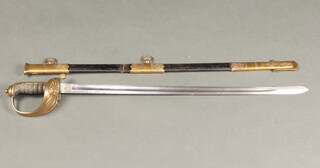 A Victorian Naval Officer's sword with 63cm etched blade, leather scabbard (reduced in length) 