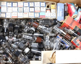 A fruit box containing a large collection of valves including Brimar, Pinnacle, some boxed 