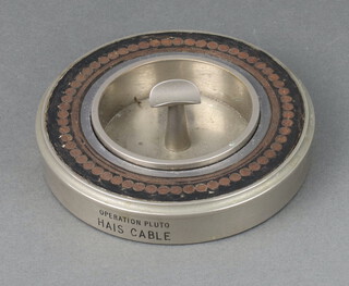 Siemens Bros. & Company Ltd., a circular cable and chrome ashtray marked Operation Pluto Hais Cable, with detachable ashtray 3cm x 12cm 