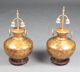 A pair of gilt metal marble effect twin handled table lamps of melon form 38cm x 29cm 