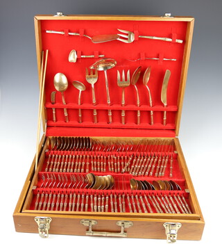 A canteen of Thai bronze cutlery with faux bamboo handles (84), contained in a hardwood case 