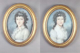 A pair of 19th Century oval pastel portraits of young ladies, unsigned, 29cm x 22cm 
