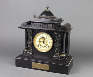 An Ansonia 8 day striking mantel clock with visible escapement, porcelain dial and Arabic numerals, contained in a black marble architectural case, with presentation plaque to R.Q.MS What. Hackeray of The 21st Queens Own Hussars on his retirement May 1913 to May 1929, complete with pendulum and key 