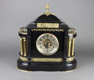 Japy Frere, a 19th Century French 8 day striking mantel clock with silvered dial and Arabic numerals contained in a polished black marble and gilt metal architectural case, the back plate marked Japy Frere 2982 6, complete with pendulum and key 46cm h x 46cm w x 18cm d 