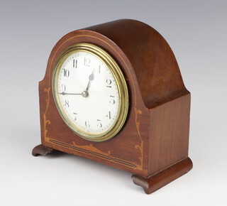 A French bedroom timepiece with enamelled dial, Arabic numerals, contained in an arch shaped inlaid mahogany case 13cm x 15cm x 7cm 