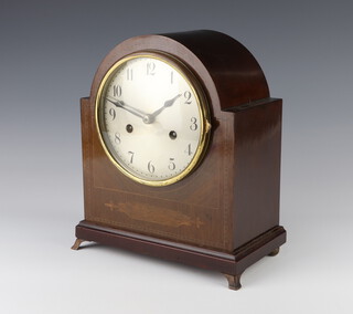 An Edwardian striking mantel clock with silvered dial and Arabic numerals contained in an arch shaped inlaid mahogany case, complete with pendulum and key 25cm x 21cm x 12cm  