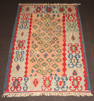 A tan, red, turquoise and blue ground Kilim rug with overall geometric design 246cm x 1279cm 