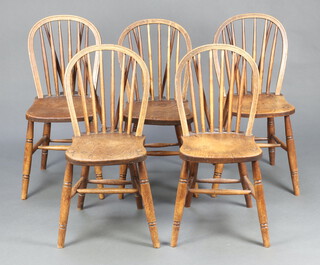 A set of 6 elm stick back Windsor chairs, raised on turned supports with H framed stretcher 87cm h x 38cm w x 45cm d (seats 23cm x 23cm) 