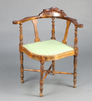An Edwardian inlaid mahogany corner chair with upholstered seat, raised on turned supports with H framed stretcher 74cm h x 68cm w x 52cm d (seat 29cm x 35cm) 