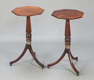 A pair of Regency style octagonal wine tables, raised on turned and reeded pillar and tripod supports 73cm h x 38cm w x 37cm d 