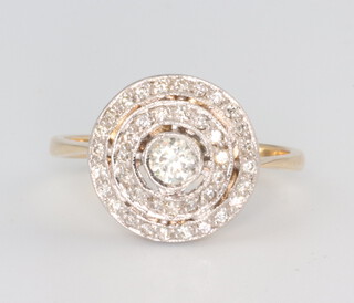 A yellow metal circular diamond cluster ring, approx. 0.5ct, 3.7 grams, size M 