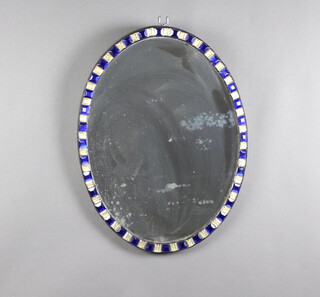 A 19th Century Irish oval plate mirror contained in a blue and clear faceted glass frame 59cm h x 44cm w 