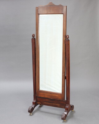 A 19th Century rectangular bevelled plate cheval mirror contained in a mahogany swing frame raised on scroll supports 129cm h x 48cm w 