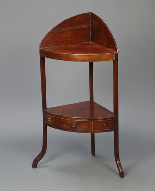 A 19th Century mahogany corner wash stand with raised back and undertier, fitted a drawer and 2 dummy drawers, raised on outswept supports 100cm h x 53cm w x 37cm d 