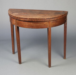 A Georgian mahogany tea table raised on square tapered supports 75cm h x 89cm w x 44cm d 