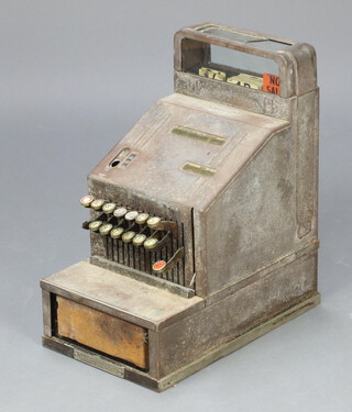A National Cash Register Company of Canada imperial cash register no. DH943337 43cm h x 38cm w x 24cm d (broken pane of glass to the top, currently jammed, 1 key is missing, 2 tops of keys are missing) 
