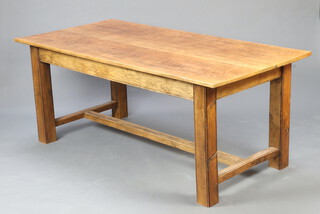 An elm refectory style dining table raised on square supports with H framed stretcher 77cm h x 183cm w x 92cm d 
