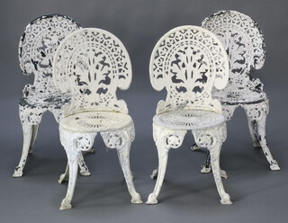A set of 4 Victorian style white painted pierced aluminium garden chairs, raised on cabriole supports 185cm h x 38cm w x 37cm d (paint loss in places)  