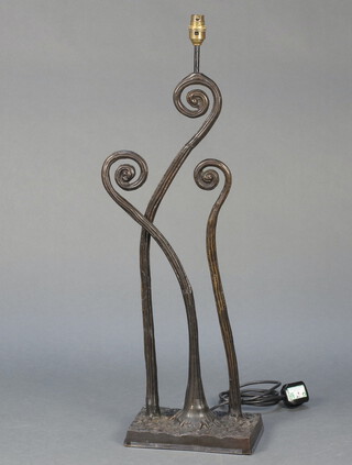 A bronze shaped table lamp on a rectangular base 76cm h x 23cm w x 15cm d 