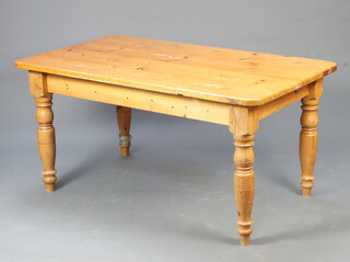 A Victorian style pine kitchen table raised on turned supports 75cm h x 89cm w (legs have been gnawed) 