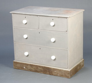 A Victorian grey painted pine chest of 2 short and 2 long drawers with white ceramic handles, raised on a platform base 83cm h x 91cm w x 50cm d 