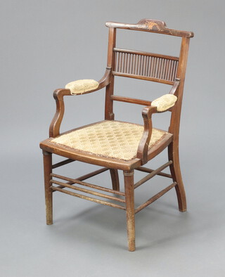 An Edwardian inlaid mahogany open armchair with upholstered seat and arms, raised on turned supports 84cm h x 47cm w x 43cm d (seat 29cm x 30cm) 