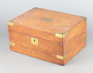 A Victorian oak and brass banded writing slope with hinged lid 15cm x 30cm x 22cm 