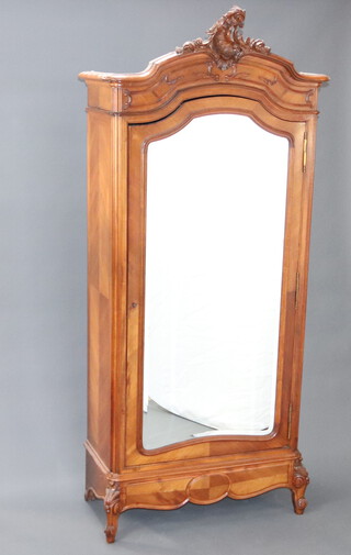 A 19th Century French kingwood armoire with carved cornice, shelved interior and hanging rail enclosed by an arch bevelled plate mirror panelled door, the  base fitted a drawer, raised on cabriole supports 247cm h x 109cm w x 50cm d 