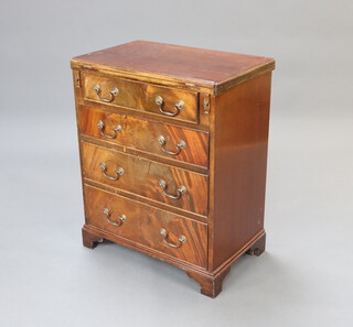 A mahogany bachelor's chest of 4 long graduated drawers with swan neck drop handles, raised on bracket feet 76cm h x 61cm w x 38cm d 