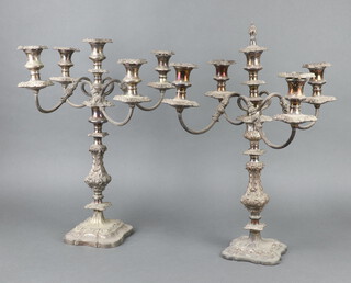 An impressive matched pair of silver plated 5 light candelabrum 53cm x 42cm 