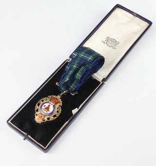 A silver and enamelled Past Presidents badge for the Retail Newsagents Book Sellers Association, presented to Mr J Forster Scottish President 1932, Birmingham 1931, cased 
 