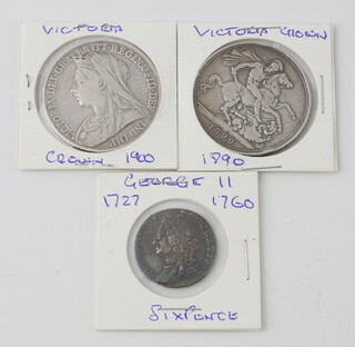 A George II sixpence together with 2 Victorian crowns 